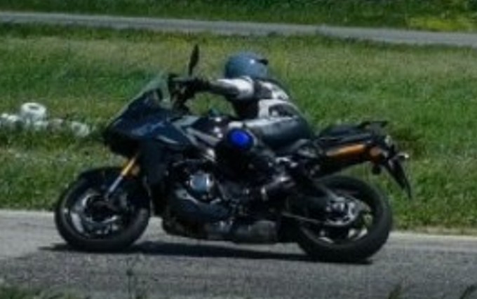 Suzuki GSX-S1000GX parked trackside